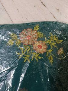 Elegant Teal Saree with Floral Embroidery