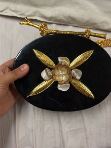 Designer Black Clutch with Gold Accents