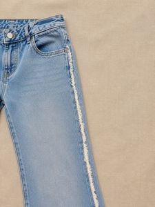 Light Wash Flare Jeans with White Trim