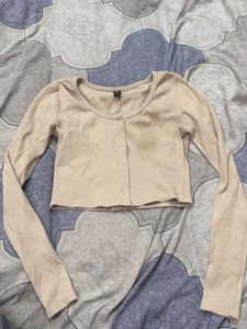 beige crop top