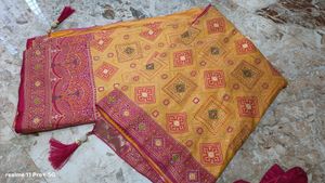 Vibrant Yellow Saree with Pink Blouse