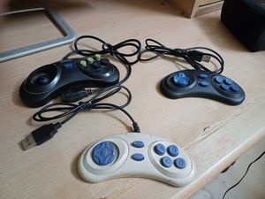3 video game remote and 8 in 1 Cassettes