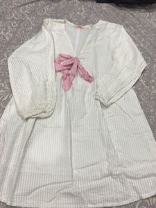 White Textured Dress with Pink Bow