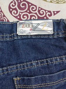 Distressed Blue Denim Jeans