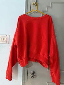 Vibrant Orange Cropped Sweatshirt