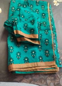 sea green beautiful flower design saree
