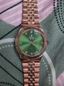 Rose Gold Watch with Green Dial