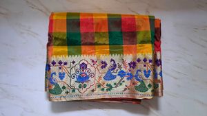 Vibrant Checked Silk Saree with Peacock Border