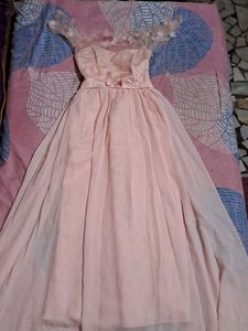 selling this peach floral tulle gown.