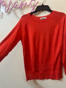 Zara's Thin Orange Sweater