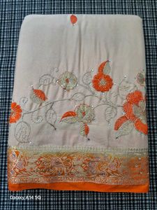 Elegant Cream & Orange Embroidered Saree