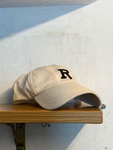 Cream Baseball Cap with 'R' logo