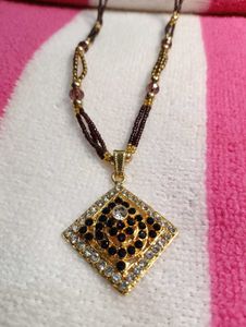 Elegant Beaded Necklace with Pendant