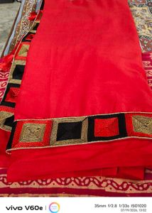 Vibrant Red Saree with Embellished Border