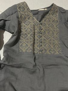 Elegant Grey Kurta with Intricate Gold Embroidery
