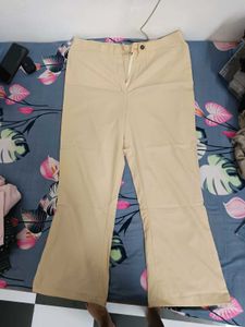 Beige colour trousers