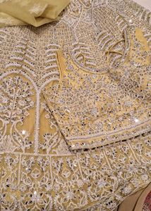 Exquisite Yellow Mirror Work Lehenga Choli