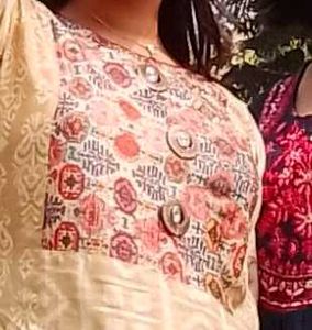Elegant Cream Kurta with Colorful Neckline