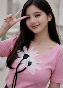 Pink Top with Floral Detail