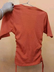 Coral Ribbed V-Neck Ruched Top