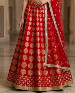 Red brocade lehnga skirt with Gold Print