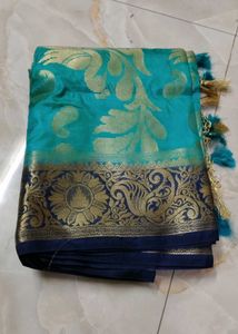 Elegant Teal & Gold Saree