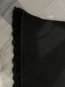 Chic Black Lace Trimmed V-Neck Top