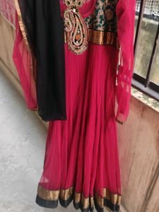 red suit with  black churidar and dupatta