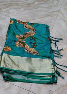 Elegant Teal Peacock Embroidered saree