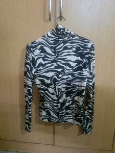 Zebra Print Turtleneck Top