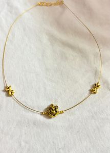 Delicate Gold Necklace with Ganesha Pendant