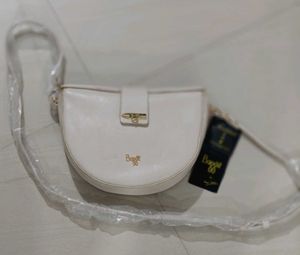 Baggit half moon sling bag