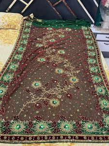 Elegant designer heavy work green  georgette saree