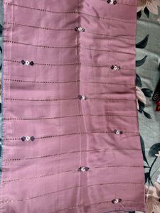 Elegant Pink Saree with Floral Embellishments
