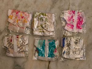 bunch of Krishna idol clothes