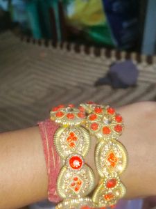 Golden Bangle with Red Stones