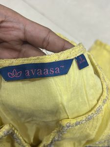 Elegant Yellow Kurta with Intricate Embellishments