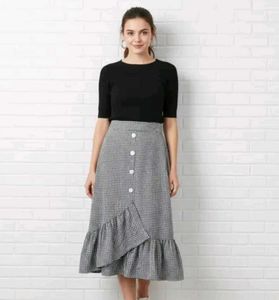 Black and white checked skirt.