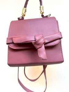 Chic Pink Handbag with Bow Detail
