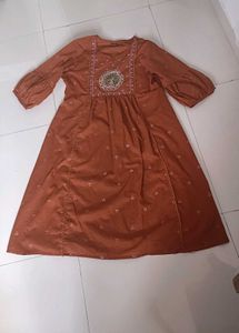 Orange Kurta with Peacock Embroidery