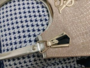 Sparkly Gold Handbag with Tassel