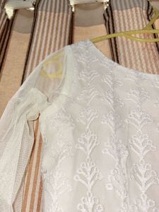 Elegant White Chikankari Kurta with golden embelli
