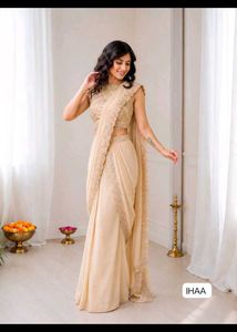 Elegant Cream Embroidered Saree