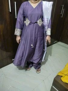 Elegant Purple Kurta Set with Intricate Embellishm