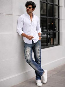 Distressed Blue Denim Jeans