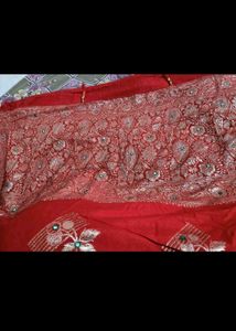 Red chiffon zari saree with stitched blouse