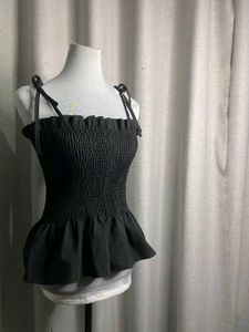 Chic Black Smocked Peplum Top