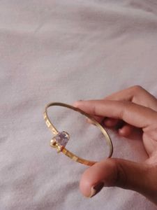 Elegant Gold Bangle with Crystal Accent