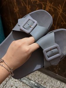 Stylish Grey Slide Sandals with Buckle Detail