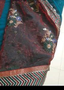 Party Wear Saree.Belive Me Its Too Preety, I Dont Wear Sarees So M Selling.Beautiful Sequence Pattern.colour Is Dark Green ,not Blue